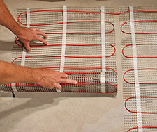 Install the radiant heating mat.